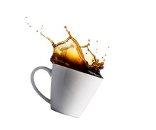 Cup Of Splashing Coffee Isolated On White