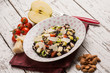 black rice salad with tomatoes apple almond and parmesan cheese