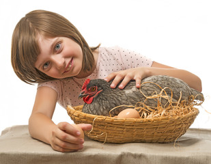 Wall Mural - little girl with a hen (chicken) - concept bio eggs