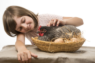 Wall Mural - little girl with a hen (chicken) - concept bio eggs