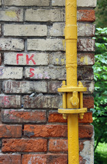 Wall Mural - wall of old dilapidated shabby brickwork of red brick with yello