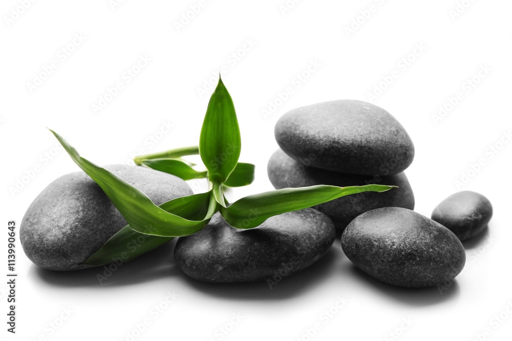 Heap of spa hot stones isolated on white
