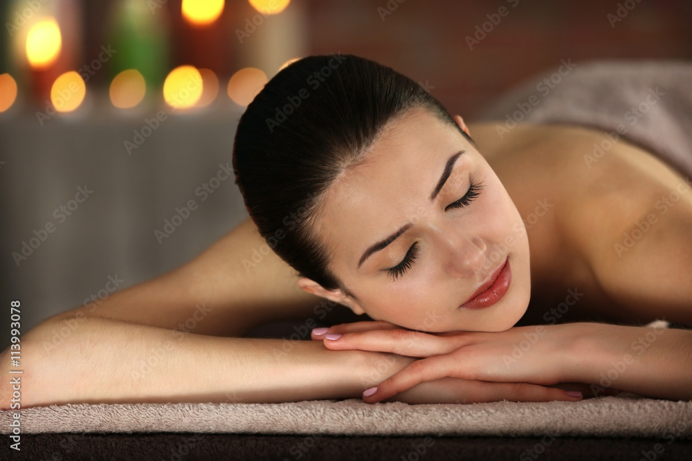 Beautiful young girl in spa salon