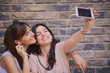 © chika_milan - Two Girls making selfie, Outdoors, leisure concept
