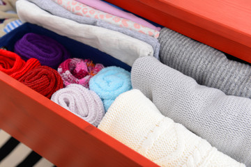 Wall Mural - Folded clothes in chest of drawers closeup