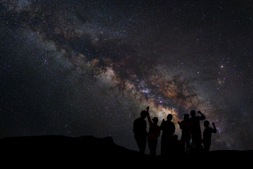 Wall Mural - landscape with milky way, night sky with stars and silhouette of
