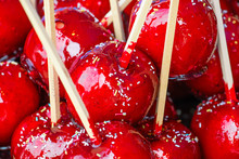 Sweet Glazed Red Toffee Candy Apples On Sticks