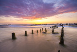 Fototapeta Morze - sunset over the sea beach
