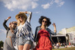 © gpointstudio - Low angle view of girls at the party.