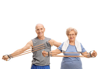 Wall Mural - Senior man and woman exercising