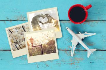 Canvas Print - travel instant photographs next to cup of coffee and airplane