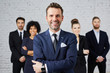 © baranq - Gruop of business people with leader at front