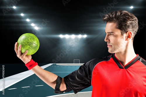 Plakat Złożony wizerunek ufny atleta mężczyzna trzyma piłkę