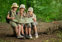 Summer Camps,scout Children Camping And Read Map In Forest