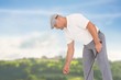 © vectorfusionart - Composite image of golf player picking up golf ball