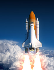 Wall Mural - space shuttle launch in the clouds