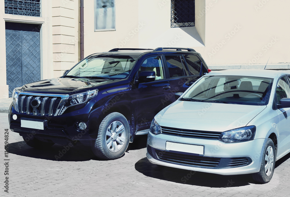 Cars parked in city street