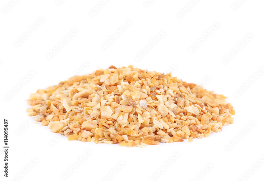 Dried chopped garlic isolated on white