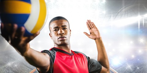 Wall Mural - Composite image of sportsman playing a volleyball