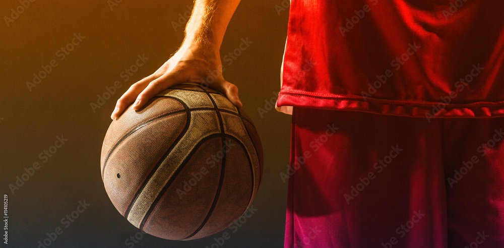 Photo Art Print Close Up On A Basketball Held By Basketball Player Photo Art Print Close Up On A Basketball Held By Basketball Player