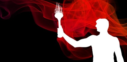 Wall Mural - Composite image of low angle view of sportsman holding a torch