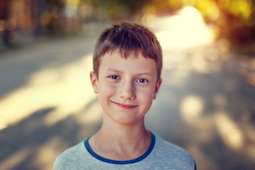 happy little boy in sunset vintage