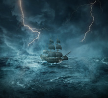 Vintage, Old Sailing Ship Lost In The Ocean In A Rainy, Stormy Night With Lightnings In The Sky. Adventure And Journey Concept