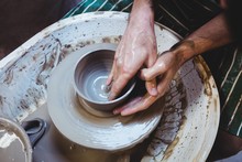 High Angle View Of Male Artist In Potter Workshop