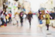 © malija - abstract blurred background of people walking in city center