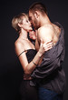© svitlychnaja - Hot and sexy young couple in love embracing and kissing.