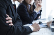 © Monet - Business people are seriously listening to the proposal