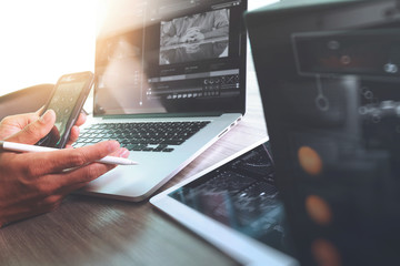 Poster - Website designer working digital tablet and computer laptop with