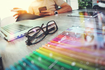 Poster - eye glass on wooden desk with Website designer working digital t