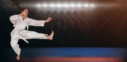 Poster - Composite image of fighter performing karate stance