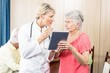 © WavebreakMediaMicro - Nurse talking to a senior woman