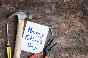 tool with word father day on paper