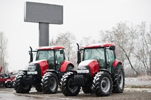Two New Red Tractor Stay At Snowy Weather