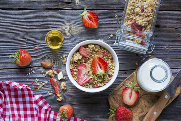 Wall Mural - Ready-made granola with dried strawberries and almonds. Healthy breakfast  cereal muesli,   fresh 