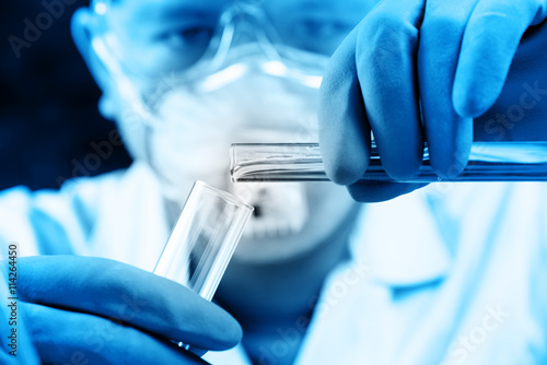 Fotografie, Obraz Hands of clinician holding tools during scientific experiment in