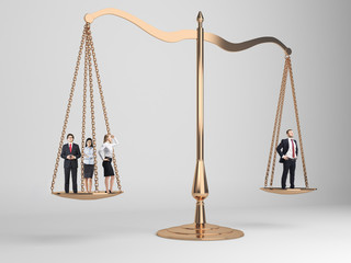 Scales of justice with people