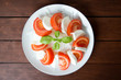 caprese on rustic table