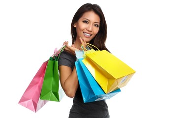 Wall Mural - Happy asian girl with shopping bags.