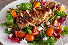 Grilled Chicken Breast Fillet With Fresh Tomatoes Vegetables Salad. Concept Healthy Food.