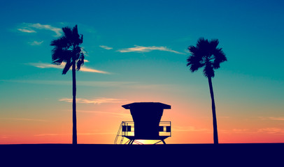 Vintage Lifeguard Tower - Vintage Lifeguard Tower on Beach at sunset in San Diego, California