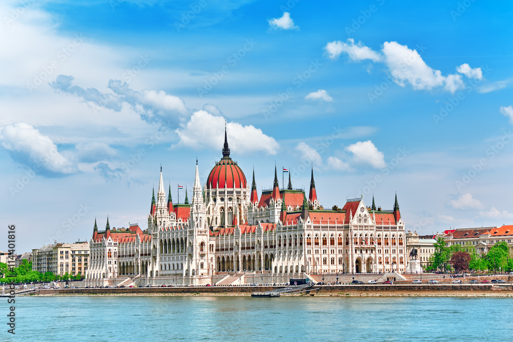 Hungarian Parliament at daytime. Budapest. View from Danube rive - obrazy, fototapety, plakaty 