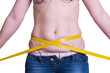 © olgasun - fat woman measuring her waist