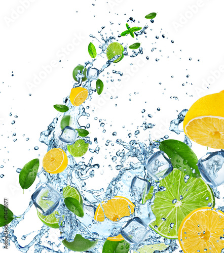 Fototapeta na wymiar Fresh limes and lemons in water splash.