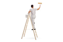 Male Decorator Painting With A Roller