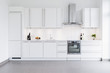 © fStop - Modern kitchen design with white cabinets