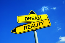 Dream Or Reality - Traffic Sign With Two Options - Motivation And Courage To Transform Dream And Ambition Into Reality. Vision And Idea Come True.